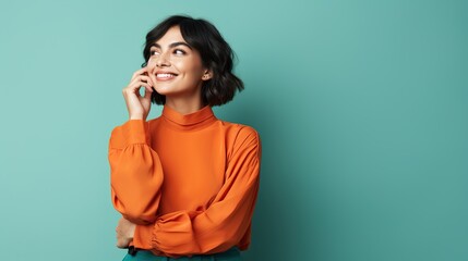 Wall Mural - cheerful entrepreneur is making with her arms folded on studio