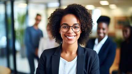 portrait of businesswoman and team