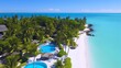 Aerial view of beautiful tropical beach and sea with coconut palm tree - Holiday Vacation concept
