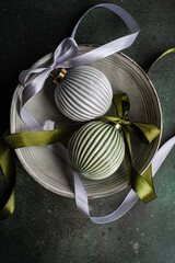Christmas baubles on bowl grey