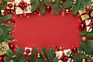 Wall Mural - red christmas background with ornament frame