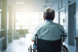 © Nikki AI - Seen From Behind an Elderly Male Patient in Wheelchair at Retirement Home or Hospital