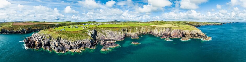 Panorama of Cliffs and Fields over Porthclais from a drone, St Davids, Haverfordwest, Wales, England