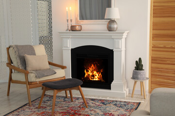 Poster - beautiful fireplace, armchair and ottoman in living room. interior design
