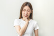 © KMPZZZ - Face expression suffering from sensitive teeth and cold, asian young woman, girl feeling hurt, pain touching cheek, mouth with hand. Toothache molar tooth, dental problem isolated on white background.