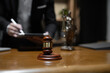 © aekachai - Judge gavel with Justice lawyers having team Concepts of Law and Legal services