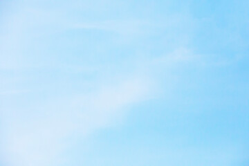Wall Mural - fantastic soft white clouds against blue sky and copy space horizontal shape