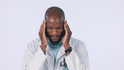 Poster - Headache, doctor and stress of man in studio with burnout, pain and healthcare challenge on white background. Frustrated, tired and sick african surgeon with fatigue, migraine or brain fog of mistake