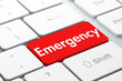 © ShutterFalcon - Concept of computer keyboard key with the word Emergency on it ready to press enter