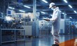 © adam - Scientists in clean suits using digital tablets