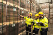 © Jack Tamrong - Wood men and woman factory workers working together in wood distribution warehouse