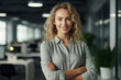 © Rafa Fernandez - Portrait of business blonde woman standing with arms crossed in office looking at camera. AI Generative