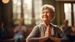 Happy grandma participating in a yoga class, emphasizing flexibility and health