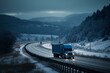 A strong blue truck hauling frozen goods in a refrigerated trailer on a wide highway in the Columbia Gorge region. Generative AI
