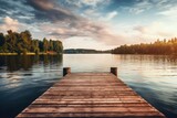 Fototapeta  - A wooden dock sitting next to a body of water