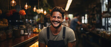 Handsome Hispanic Barista Laughing Into The Camera