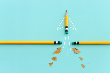 Wall Mural - Concept image of pencil as rocket metaphor on blue background