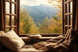 An open window with a book and a blanket placed on it. This image can be used to depict relaxation, cozy reading nooks, or a peaceful ambiance.