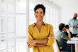 © (JLco) Julia Amaral - Portrait of a black business woman standing in an office