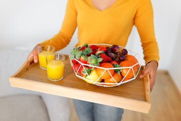 Black Lady Holding Tray With Fruits And Juice Indoor, Cropped