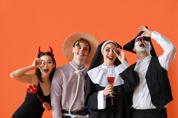 Sticker - Group of friends in costumes for Halloween party on red background