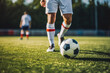 © VisualProduction - Soccer player ready for the penalty shot, close up of soccer player lower leg shot upfront,