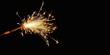 sparkler on a black background, Christmas and new year eve celebration, spark isolated mockup overlay