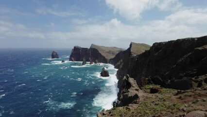 Wall Mural - Beautiful views of Miradouro da Ponta do Rosto on a windy day with beautiful blue water