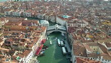 Venice, Aerial view of Rialto bridge crossing the Grand Canal in Venice downtown, Veneto, Italy
