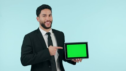 Canvas Print - Professional man, tablet green screen and presentation, website space, business information and advertising in studio. Face of corporate worker, digital mockup and tracking marker on blue background