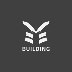 The building logo resembles the letters V and E, and is in the shape of a tetragram. Suitable for property and apartment businesses.