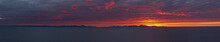 Panorama Of Red Clouds Over Bristol Bay At Sunrise In Summer, Walrus Islands State Game Sanctuary, Round Island, Bristol Bay, Western Alaska, USA