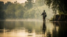Fisherman , Angler At Dawn To Fish In The River
