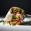 AMexican burrito, filled with flavorful ingredients like rice, beans, guacamole, salsa, and more, wrapped in a tortilla, offering a satisfying Tex-Mex treat.
