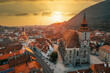 Aerial drone view of the The Black Church in Brasov at sunset, Romania