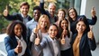 © sirisakboakaew - Very happy employees give a thumbs up recommending the company's good quality services. Smiling coworkers from different nationalities celebrate success or victory.