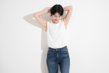 Wall Mural - Woman in T-shirt with arms raised Image of hair removal, etc.