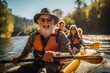 © Anna - elderly man with a gray beard kayaking on the river with friends