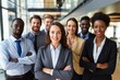 © Acronym - Multiracial diverse business team headed with boss posing to camera. Smiling businesspeople in office. The concept of business.