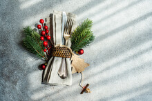 Overhead View Of A Festive Christmas Cutlery Setting On A Table