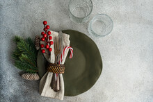 Overhead View Of A Festive Christmas Place Setting On A Table