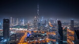 Fototapeta Miasto - Panorama showing aerial view of tallest towers in Dubai Downtown skyline and highway night timelapse.