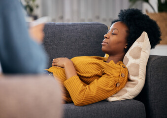 Wall Mural - Therapy, sofa and black woman relax in consultation for mental health, help and listening to communication. Psychologist, counselling and patient lying on couch in peace, calm and sleep in comfort