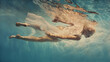 A woman in white swims underwater as if flying in zero gravity