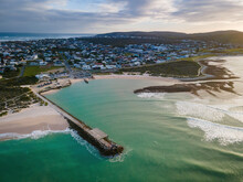 Aerial View Of Small Fishing Harbour Struisbaai And Surrounding Village About Four Kilometres From Cape Agulhas, The Southernmost Point Of The African Continent, Western Cape, South Africa.