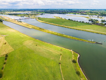 Aerial View Of River Nederrijn With Weir And Lock Complex Between Amerongen And Maurik, Border Between Provinces Of Utrecht And Gelderland, Netherlands.
