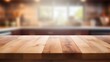 © NovaVision - Wooden Countertop with a Blurred Lighten Kitchen in the Background. Generative ai
