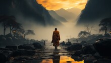 Back View Of Monk Walking In A Mountain With Amid Mist