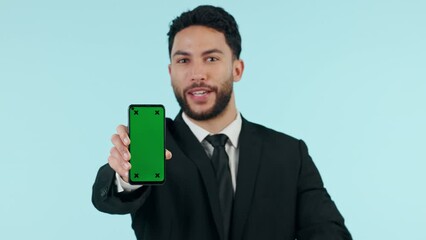 Sticker - Happy businessman, phone and pointing to green screen in advertising against a studio background. Portrait of man or business employee show mobile smartphone app, display or recommendation on mockup