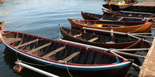 Rowboats Moored By A Dock At Skeppsholmen; Stockholm, Sweden
